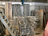 a room filled with lots of different types of metal pipes