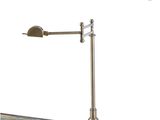 un gros plan d'une lampe posée sur un pied, avec un miroir