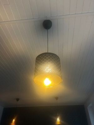 a light that is hanging from the ceiling in the room