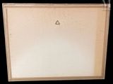 an old picture of a picture frame with a triangle on it