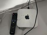 two remote controls and a box on the floor