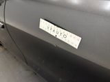 a close up of a car with a sticker on it