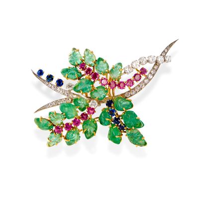 an emerald, ruby, sapphire and diamond broochle