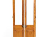pair of antique oak double doors with glass panels