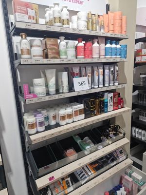 a lot of beauty products on the shelves in the store