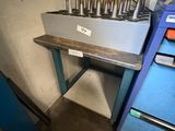 an image of a work bench with a bunch of tools on it