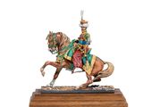 figurine of a man on a horse with a hat on his head