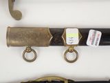 several different types of brass objects are displayed on a white surface