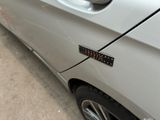 a close up of a car with a sticker on it