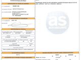a close up of a document with a picture of a car