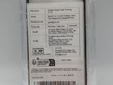 a close up of the back of a black and white cell phone