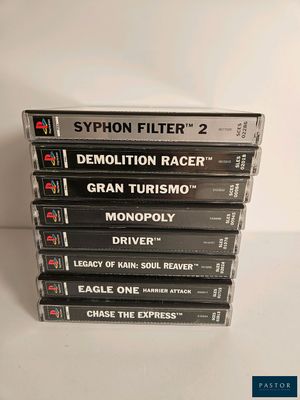 four cassettes stacked on top of each other on a table