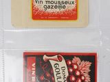 three different types of french wine labels on a white surface