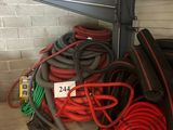 a pile of hoses and hoses in a garage
