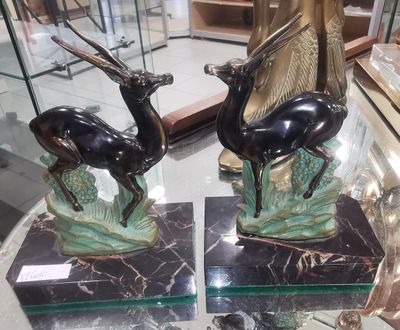 Dans le gout de SANDOZ Paire de serre livre en laiton gravé …