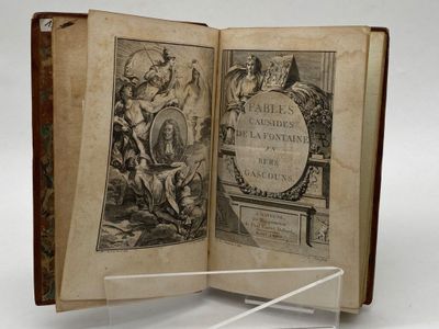 an open book with a picture of a man and a woman on it