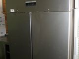 an image of a stainless steel refrigerator in a kitchen