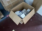 a cardboard box with a bunch of items inside of it
