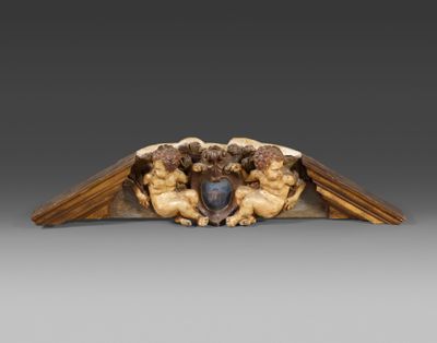 une image représentant une sculpture en bois d'un homme et d'une femme