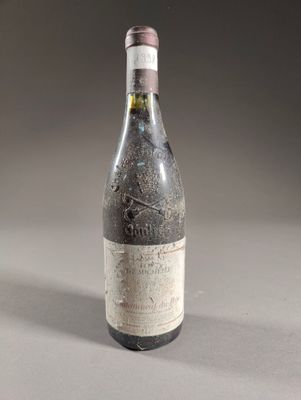 a bottle of wine that is sitting on a table