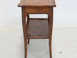an image of a small wooden table with a shelf underneath it