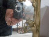 une personne se prenant en photo dans un miroir