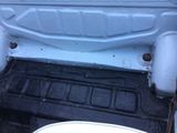 a white toilet in the back of a truck