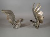 pair of silver plated rooster figurines on stand
