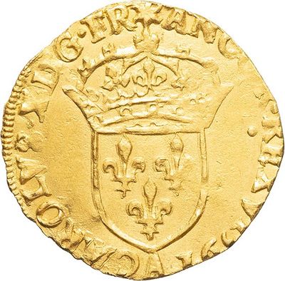 a gold coin with a crown on top of it