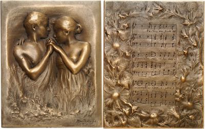 two bronze plaques of two women with musical notes on them