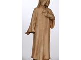 a statue of a woman in a brown robe holding her hand