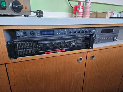 a radio that is sitting on top of a cabinet