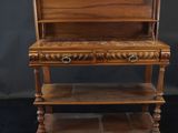 an old wooden desk with a shelf on top of it