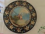 a picture of a painting on a wall hanging on the wall