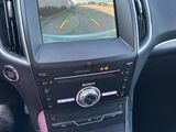 a picture of a car dashboard with a view of the road