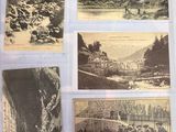 several old postcards of a mountain scene with people and animals