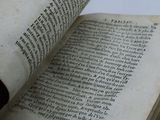 an open book that is sitting on a table
