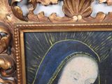 a picture of a painting of a woman with a crown on her head