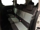 the back seats of a car with two rows of seats in it