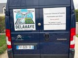 a van that is parked on the side of the road