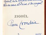 an old piece of paper with writing on it sitting on a table
