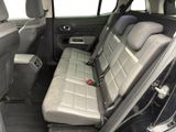 a seat in the back of a car that is empty