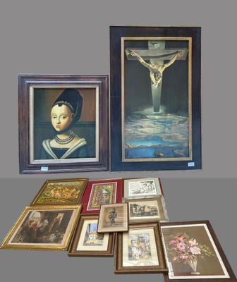 several framed and unframed paintings of a woman with a crucififix