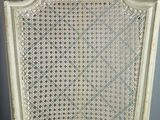 an image of a chair with a cushion on top of it