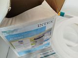 a box with a white hose and a box with a white hose