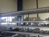 many shelves with boxes and boxes on them in a warehouse