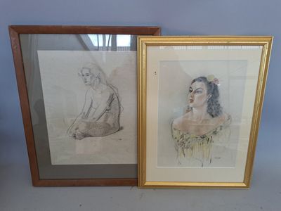 two framed drawings of a woman and a man sitting on a couch