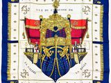 une image représentant une écharpe bleue et dorée ornée d'un blason
