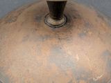 a close up of a metal object on a table