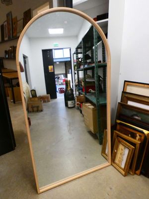 a large mirror in the middle of a room
